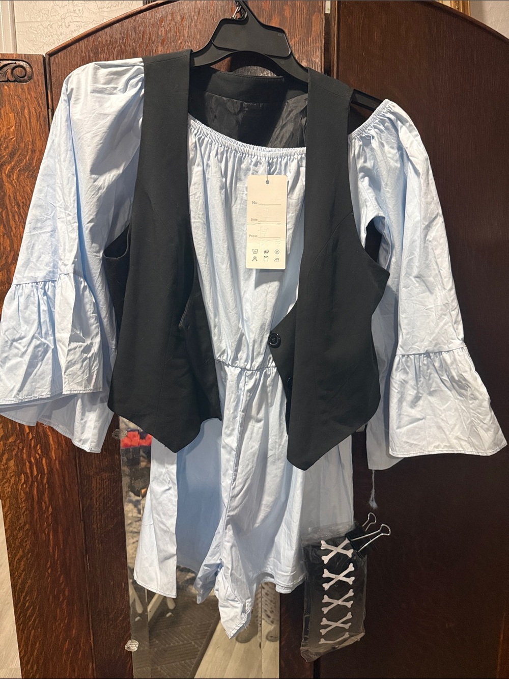 Light Blue Off-Shoulder Romper with Black Vest Layer
